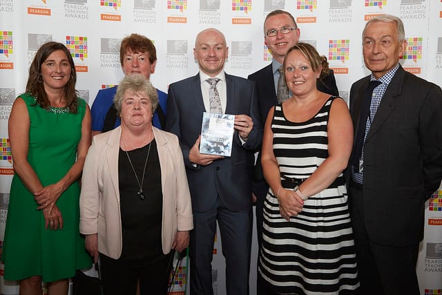 Mr Baker, Headteacher, with representatives from the 'Outstanding Team' and Rt Hon Frank Field MP